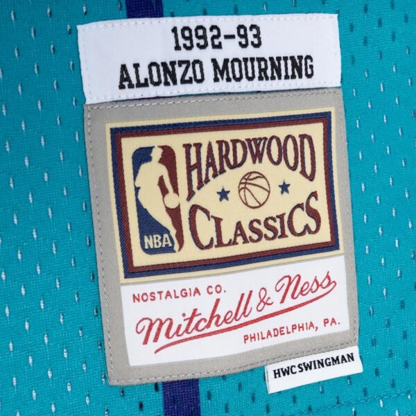 Alonzo Mourning Charlotte Hornets Mitchell & Ness Hardwood Classics 1992/93 Split Swingman Jersey - Teal/Purple